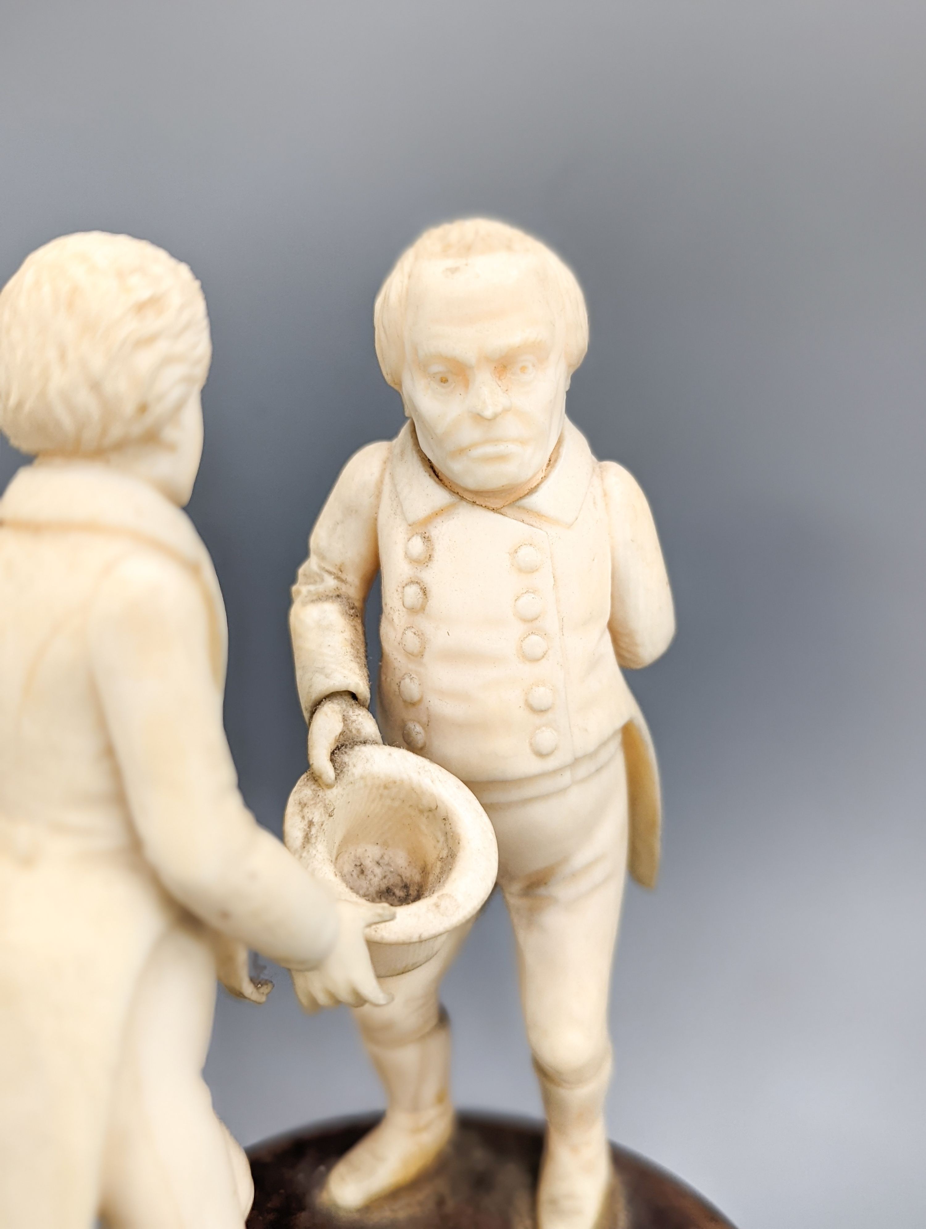 Three South German ivory Dickens characters groups or figures, early 20th century, tallest 15.5cm